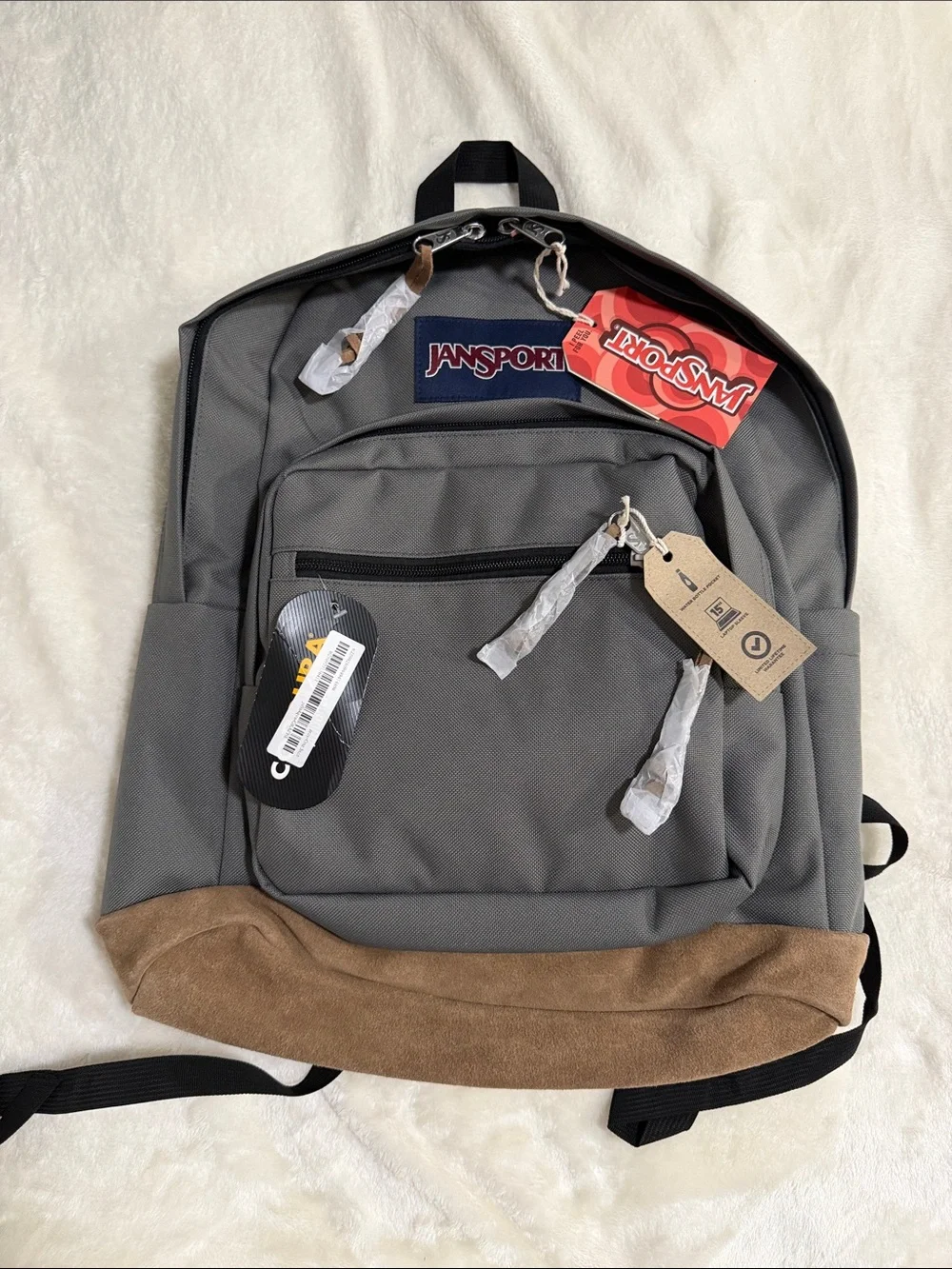Jansport Gray Backpack with Brown Suede Base